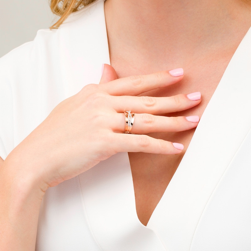 Main Image 2 of 1/6 CT. T.W. Diamond Criss-Cross Concave Ring in 10K Rose Gold