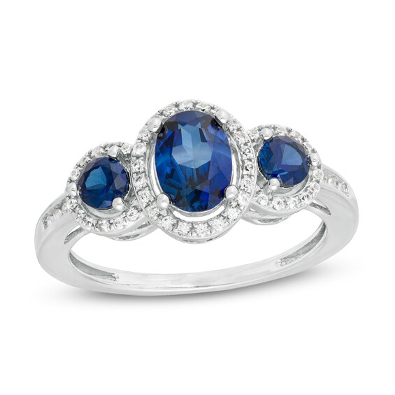 Blue Sapphire and 1/6 CT. T.w. Diamond Three Stone Ring in 10K White Gold