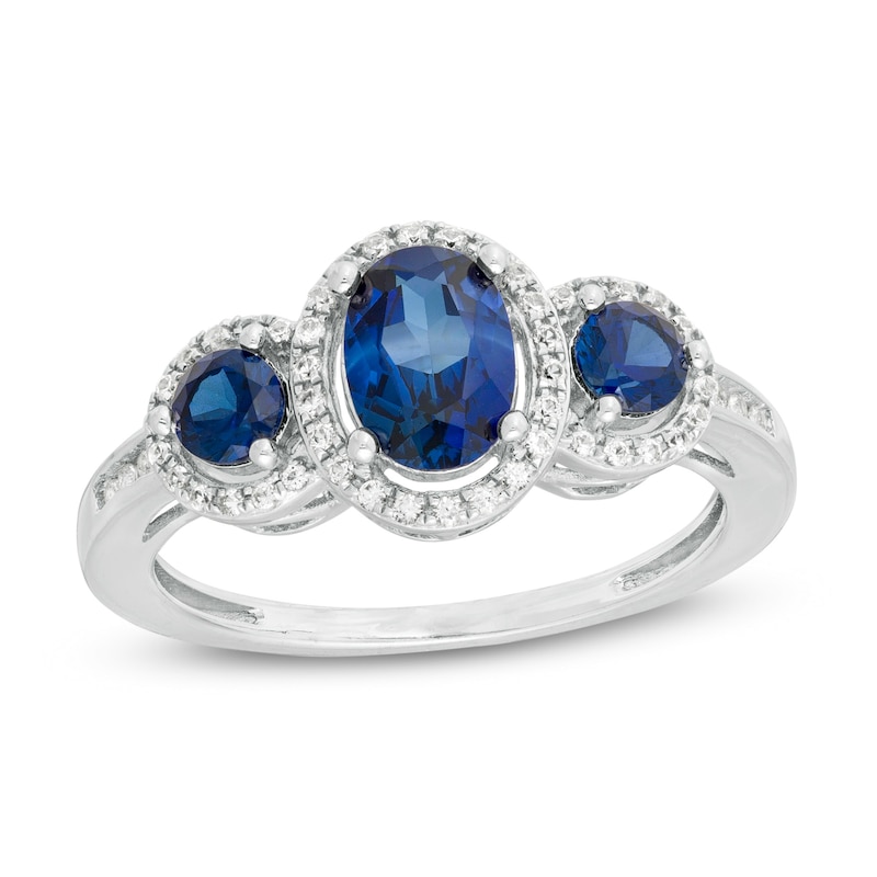 Main Image 1 of Blue Sapphire and 1/6 CT. T.W. Diamond Three Stone Ring in 10K White Gold