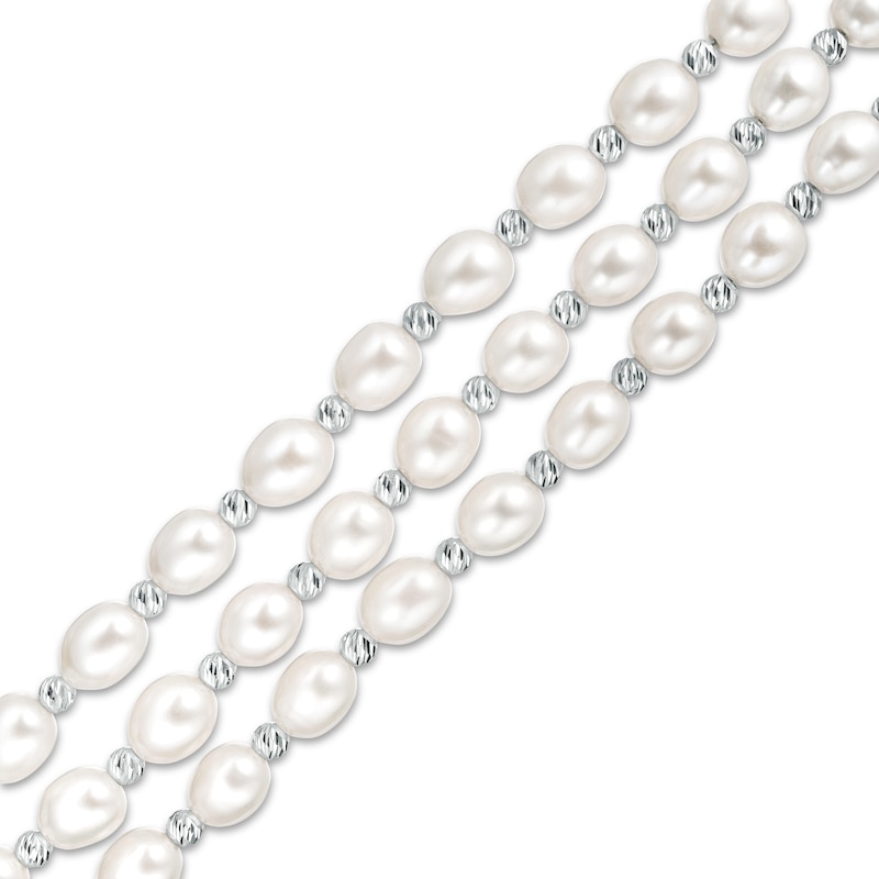 IMPERIAL® Cultured Freshwater Pearl and Diamond-Cut Bead Triple Strand Bracelet with Sterling Silver Clasp - 7.25"