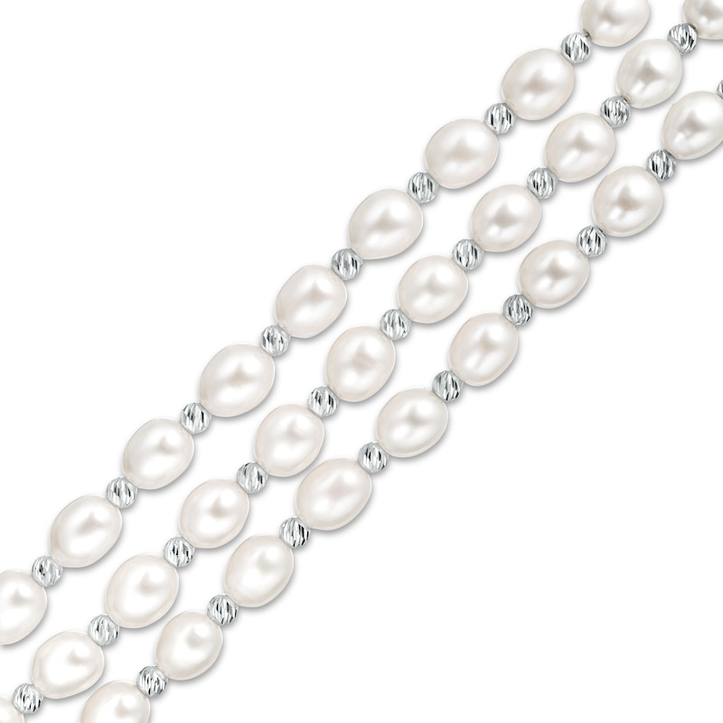 Main Image 1 of IMPERIAL® Freshwater Cultured Pearl and Diamond-Cut Bead Triple Strand Bracelet with Sterling Silver Clasp-7.25"