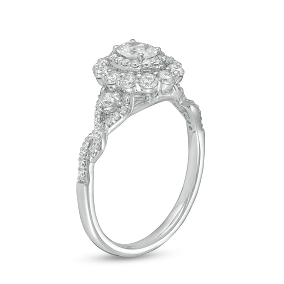 1 CT. T.w. Oval Diamond Scallop Frame Twist Shank Engagement Ring in 14K White Gold