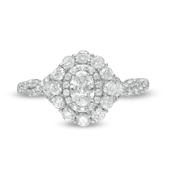 1 CT. T.w. Oval Diamond Scallop Frame Twist Shank Engagement Ring in 14K White Gold