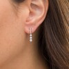 Thumbnail Image 2 of 1/2 CT. T.W. Diamond Past Present Future® Linear Graduated Drop Earrings in 10K White Gold