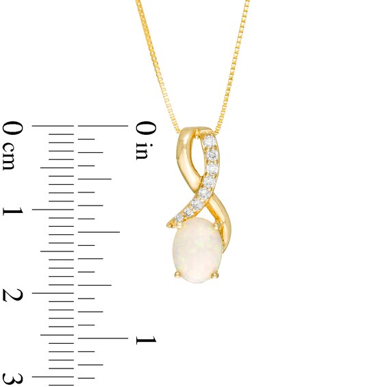 Oval Opal and 1/10 CT. T.w. Diamond Ribbon Pendant in 10K Gold