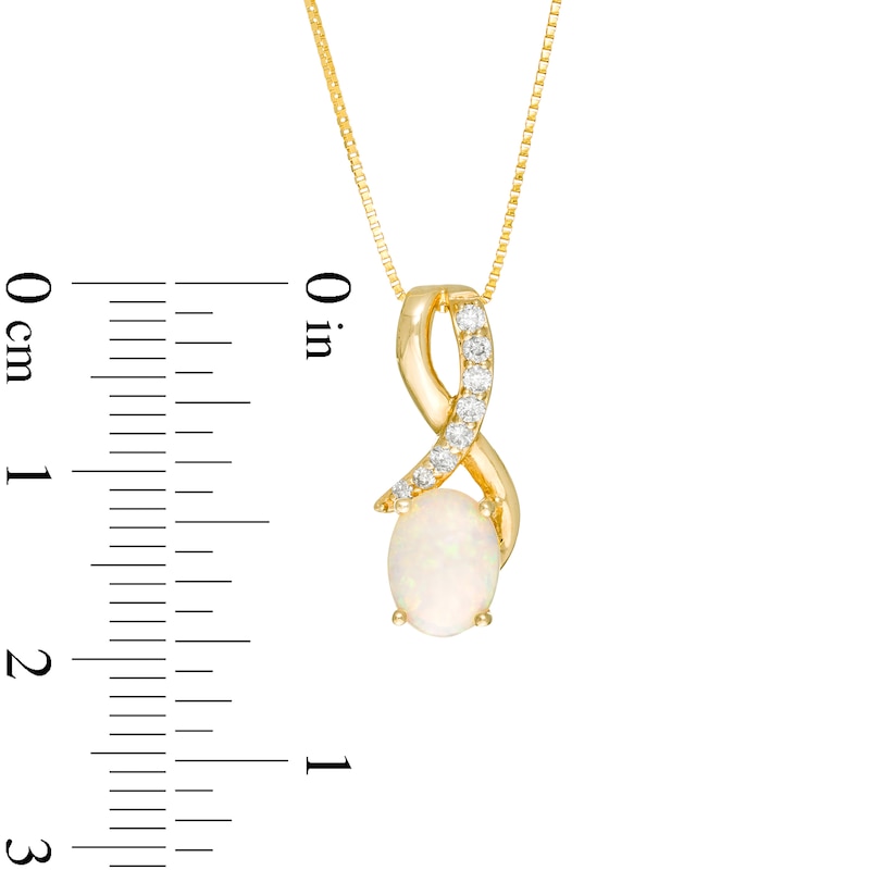 Main Image 3 of Oval Opal and 1/10 CT. T.W. Diamond Ribbon Pendant in 10K Gold