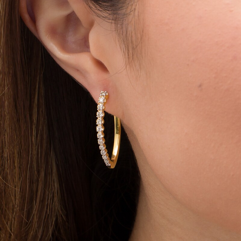 Main Image 2 of 1/2 CT. T.W. Diamond Oval Hoop Earrings in 10K Gold