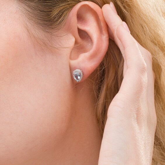Pear-Shaped Aquamarine and 1/8 CT. T.w. Diamond Teardrop Frame Stud Earrings in 10K White Gold