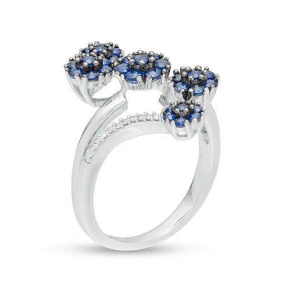Blue Sapphire and 1/20 CT. T.w. Diamond Linear Orbit Split Shank Ring in Sterling Silver