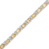 Thumbnail Image 0 of Oval Citrine and Diamond Accent Tennis Bracelet in Sterling Silver - 7.5"