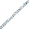 Thumbnail Image 0 of Oval Sky Blue Topaz and Diamond Accent Tennis Bracelet in Sterling Silver - 7.5"