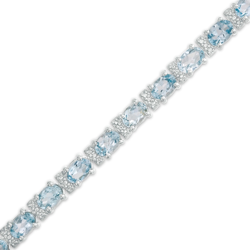 Oval Sky Blue Topaz and Diamond Accent Tennis Bracelet in Sterling Silver - 7.5"