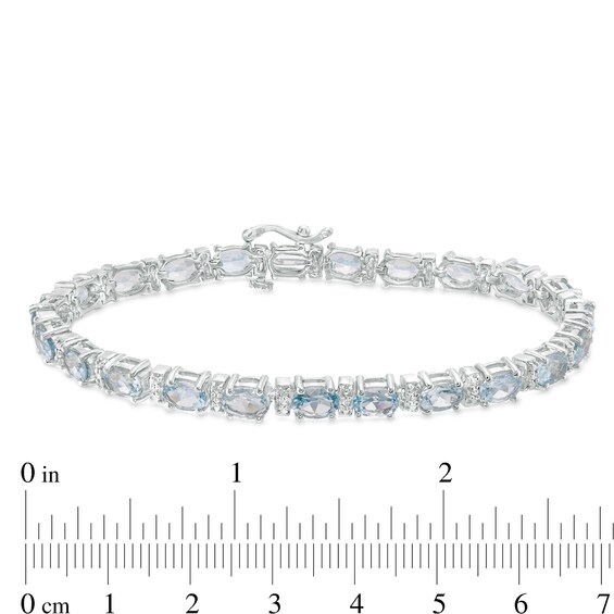 Oval Sky Blue Topaz and Diamond Accent Tennis Bracelet in Sterling Silver - 7.5"