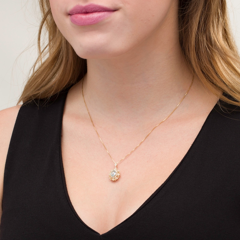 Main Image 2 of Oval Aquamarine and 1/15 CT. T.W. Diamond Vintage-Style Pendant in 10K Gold