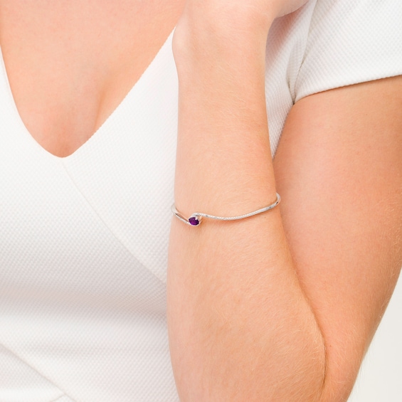 Oval Amethyst and 1/20 CT. T.w. Diamond Bypass Bangle in Sterling Silver