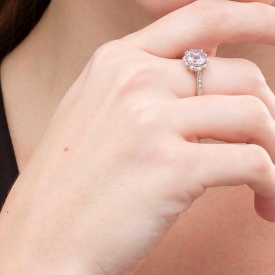 8.0mm Amethyst and 1/15 CT. T.w. Diamond Petal Frame Ring in Sterling Silver