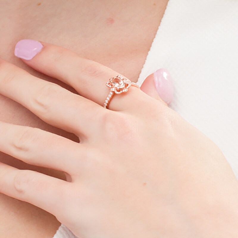 Main Image 2 of Oval Morganite and 1/4 CT. T.W. Diamond Butterfly Frame Ring in 10K Rose Gold