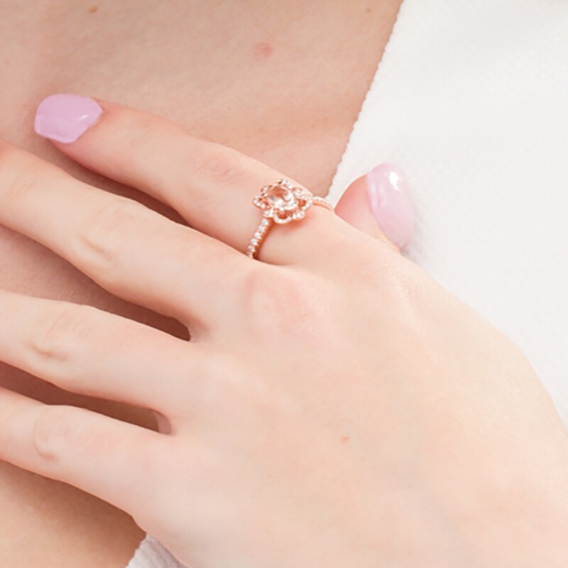 Oval Morganite and 1/4 CT. T.W. Diamond Butterfly Frame Ring in 10K Rose Gold