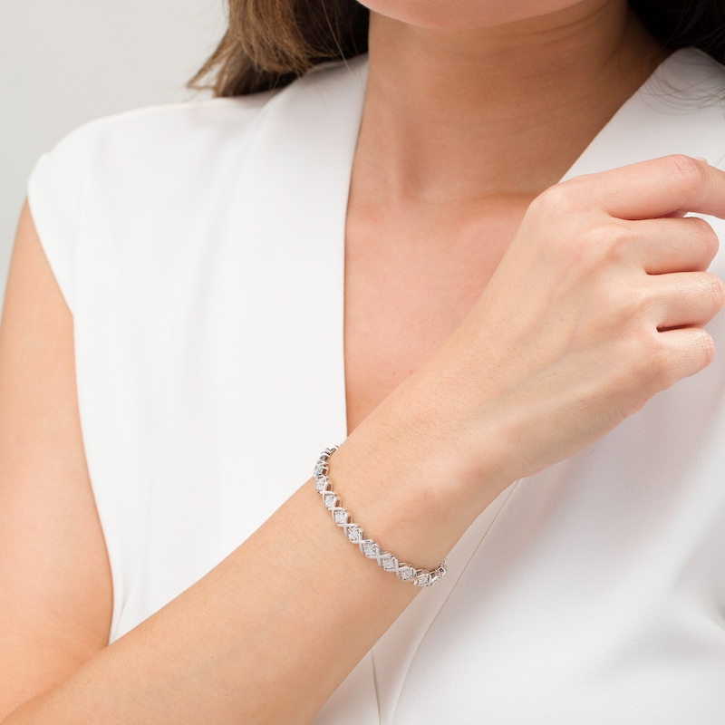 Main Image 2 of 1/10 CT. T.W. Diamond "XO" Bracelet in Sterling Silver - 7.25"