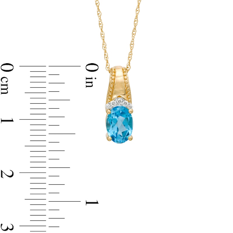 Main Image 3 of Oval Swiss Blue Topaz and Diamond Accent Beaded Drop Pendant in 10K Gold