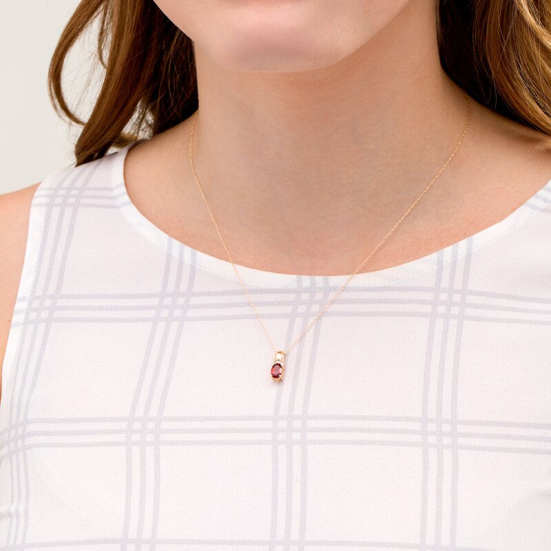 Main Image 2 of Oval Garnet and Diamond Accent Beaded Drop Pendant in 10K Gold
