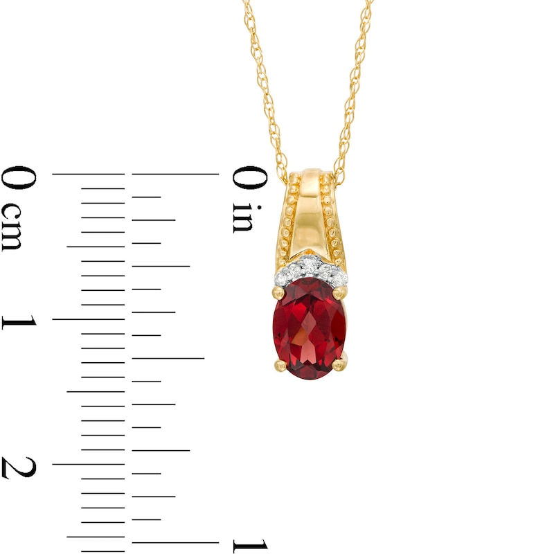 Main Image 3 of Oval Garnet and Diamond Accent Beaded Drop Pendant in 10K Gold