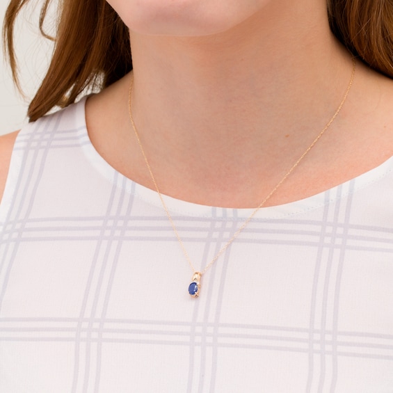 Oval Blue Sapphire and Diamond Accent Beaded Drop Pendant in 10K Gold