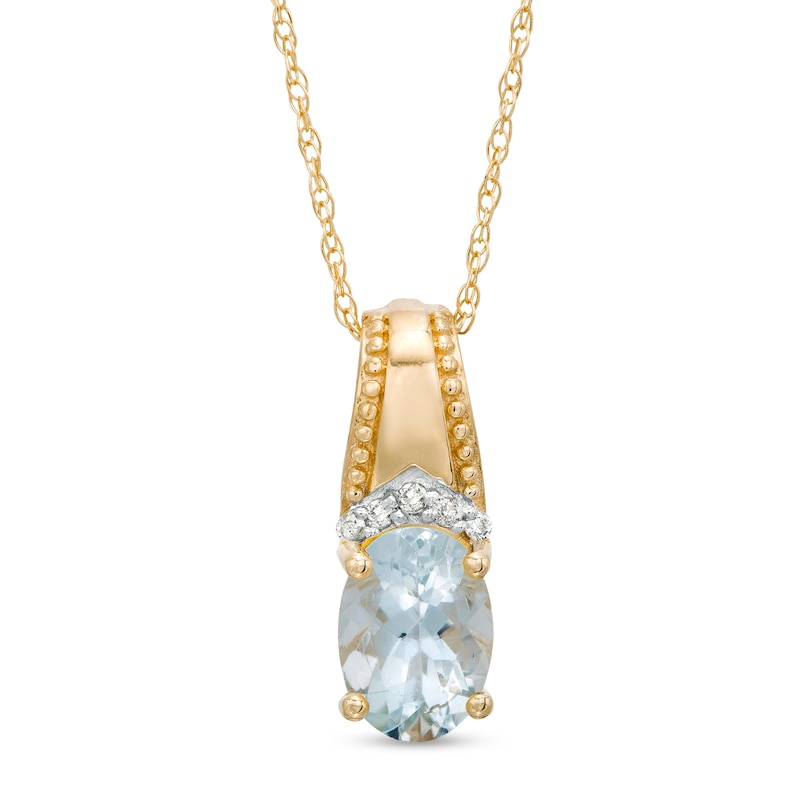 Main Image 1 of Oval Aquamarine and Diamond Accent Beaded Drop Pendant in 10K Gold