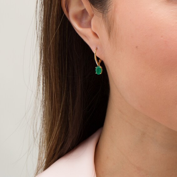 Oval Emerald and 1/20 CT. T.W. Diamond Drop Earrings in 10K Gold Oval Emerald and 1/20 CT. T.W. Diamond Drop Earrings in 10K Gold