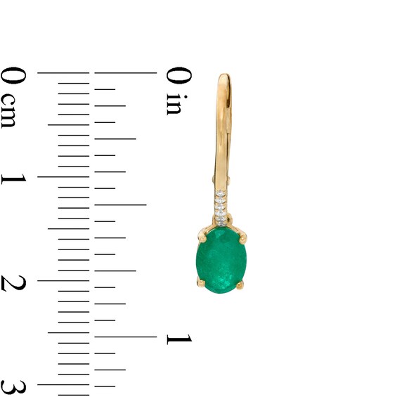 Oval Emerald and 1/20 CT. T.W. Diamond Drop Earrings in 10K Gold Oval Emerald and 1/20 CT. T.W. Diamond Drop Earrings in 10K Gold