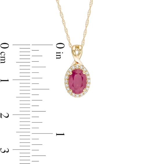 Oval Ruby and 1/15 CT. T.w. Diamond Frame Pendant in 10K Gold
