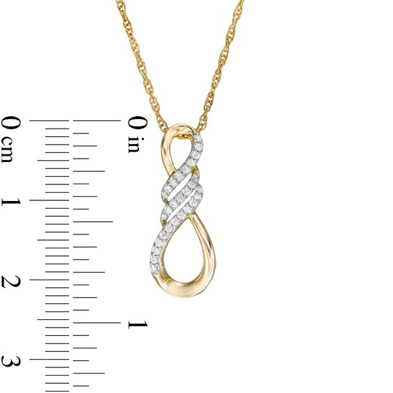 1/8 CT. T.w. Diamond Infinity Flame Pendant in 10K Gold
