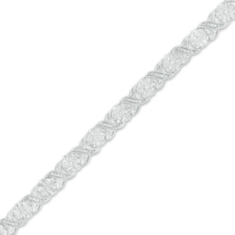 1/4 CT. T.W. Diamond Floral "XO" Link Bracelet in Sterling Silver - 7.25"