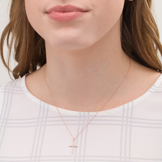 1/5 CT. T.W. Baguette and Round Diamond Cross Pendant in 10K Rose Gold 1/5 CT. T.W. Baguette and Round Diamond Cross Pendant in 10K Rose Gold