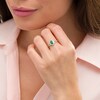 Thumbnail Image 2 of Oval Emerald and 1/5 CT. T.W. Diamond Frame Split Shank Ring in 10K Gold