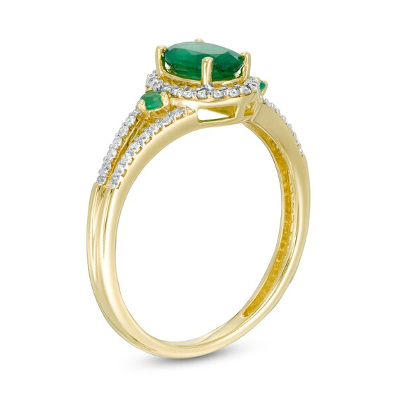 Oval Emerald and 1/5 CT. T.w. Diamond Frame Split Shank Ring in 10K Gold