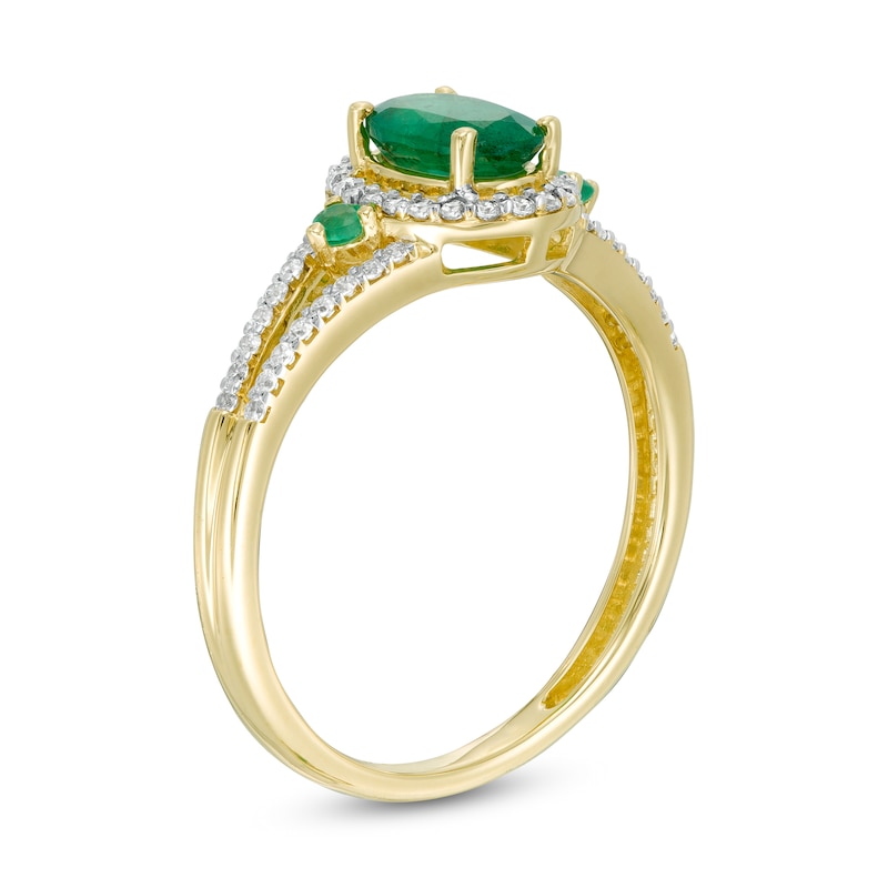 Oval Emerald and 1/5 CT. T.W. Diamond Frame Split Shank Ring in 10K ...