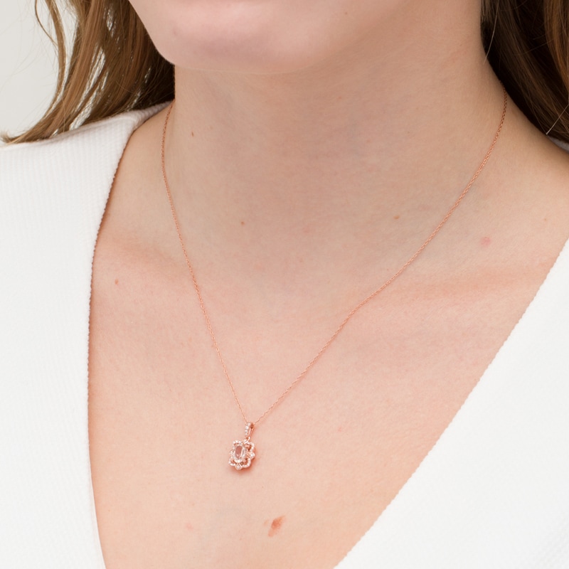 Main Image 2 of Oval Morganite and 1/10 CT. T.W. Diamond Butterfly Frame Pendant in 10K Rose Gold