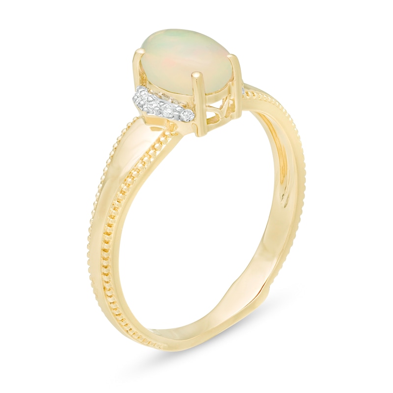 Oval Opal and 1/20 CT. T.W. Diamond Collar Frame Vintage-Style Ring in 10K Gold