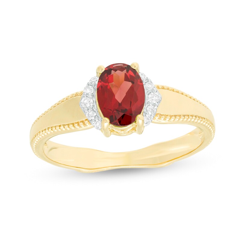 Main Image 1 of Oval Garnet and 1/20 CT. T.W. Diamond Collar Frame Vintage-Style Ring in 10K Gold