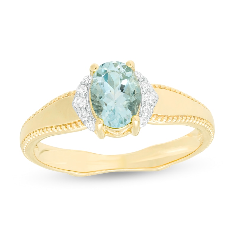 Main Image 1 of Oval Aquamarine and 1/20 CT. T.W. Diamond Collar Frame Vintage-Style Ring in 10K Gold