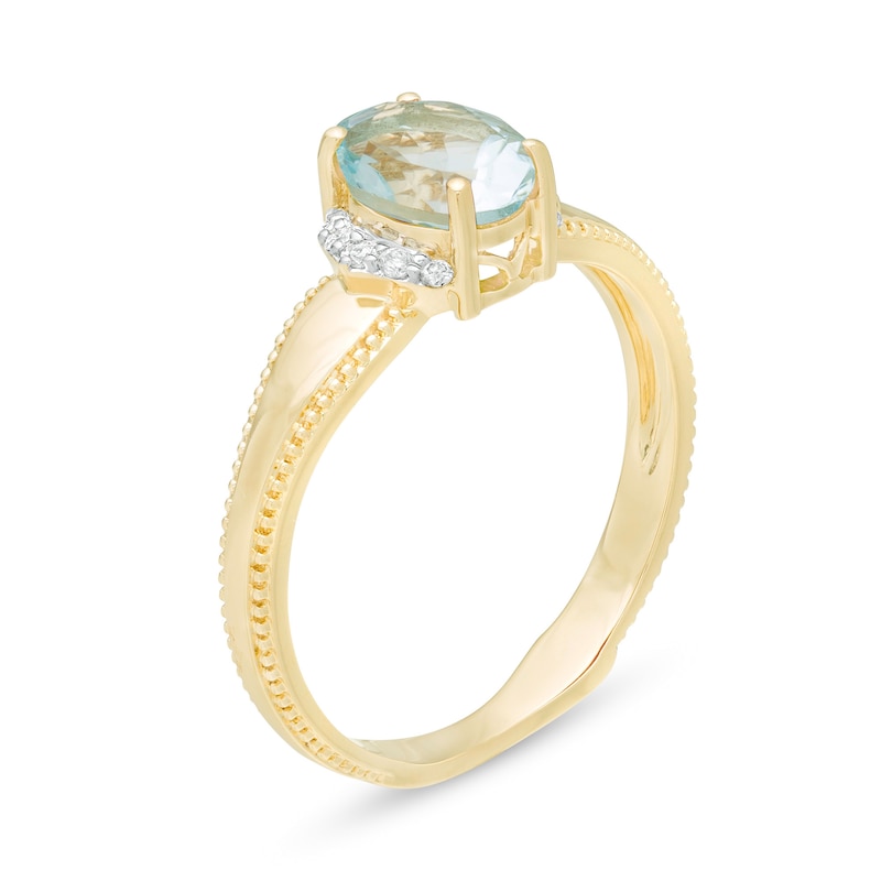 Oval Aquamarine and 1/20 CT. T.W. Diamond Collar Frame Vintage-Style Ring in 10K Gold