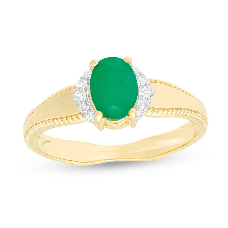 Main Image 1 of Oval Emerald and 1/20 CT. T.W. Diamond Collar Frame Vintage-Style Ring in 10K Gold