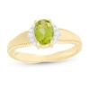 Thumbnail Image 1 of Oval Peridot and 1/20 CT. T.W. Diamond Collar Frame Vintage-Style Ring in 10K Gold