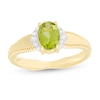 Thumbnail Image 0 of Oval Peridot and 1/20 CT. T.W. Diamond Collar Frame Vintage-Style Ring in 10K Gold