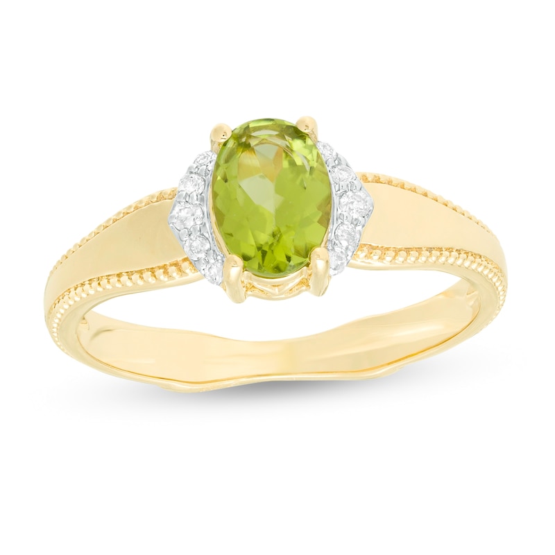 Main Image 1 of Oval Peridot and 1/20 CT. T.W. Diamond Collar Frame Vintage-Style Ring in 10K Gold