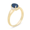 Oval Blue Sapphire and 1/20 CT. T.W. Diamond Collar Frame Vintage-Style Ring in 10K Gold