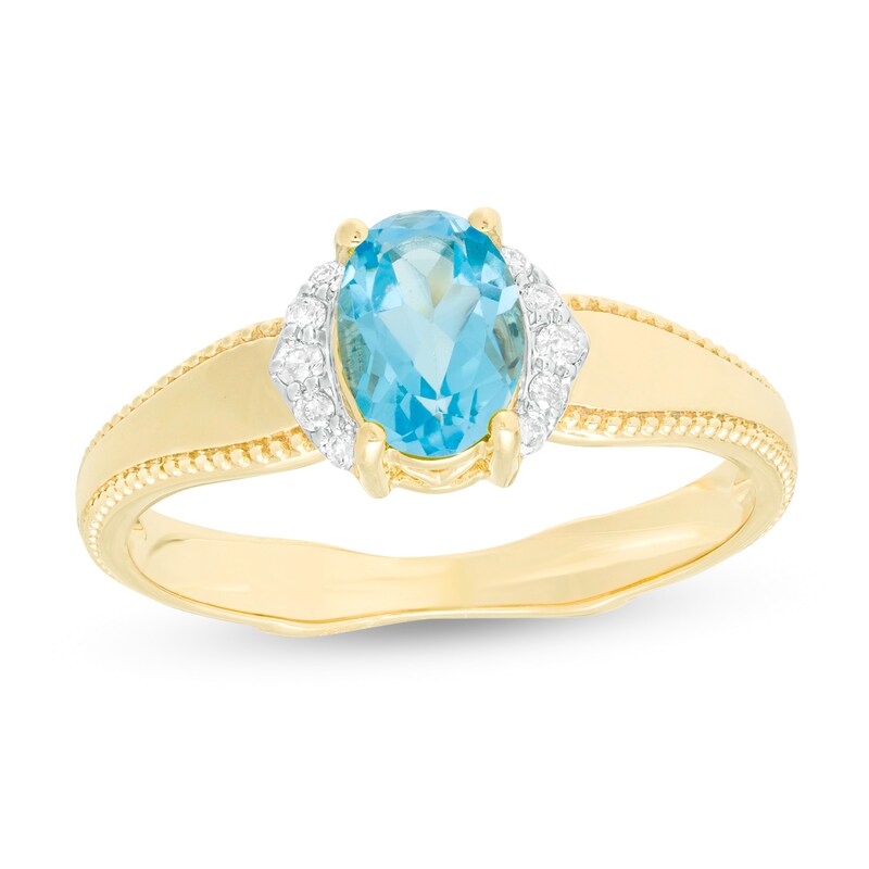 Main Image 1 of Oval Swiss Blue Topaz and 1/20 CT. T.W. Diamond Collar Frame Vintage-Style Ring in 10K Gold