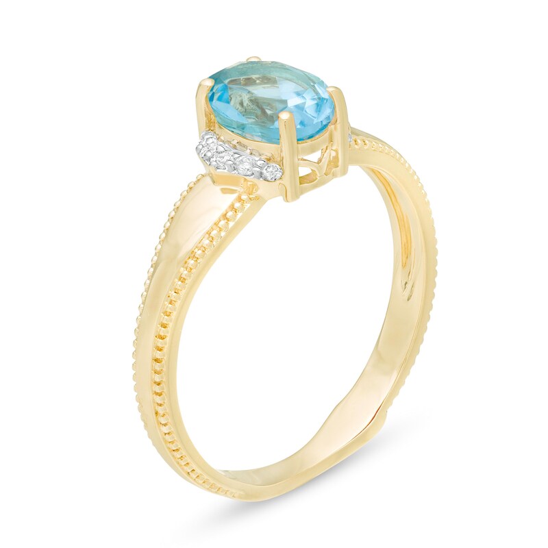 Main Image 3 of Oval Swiss Blue Topaz and 1/20 CT. T.W. Diamond Collar Frame Vintage-Style Ring in 10K Gold