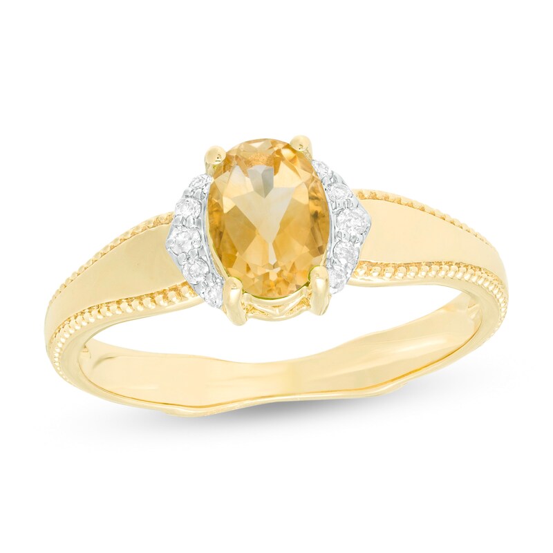 Oval Citrine and 1/20 CT. T.W. Diamond Collar Frame Vintage-Style Ring in 10K Gold